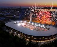 Uudistunut Olympiastadion yöaikaan ilotulisten kanssa